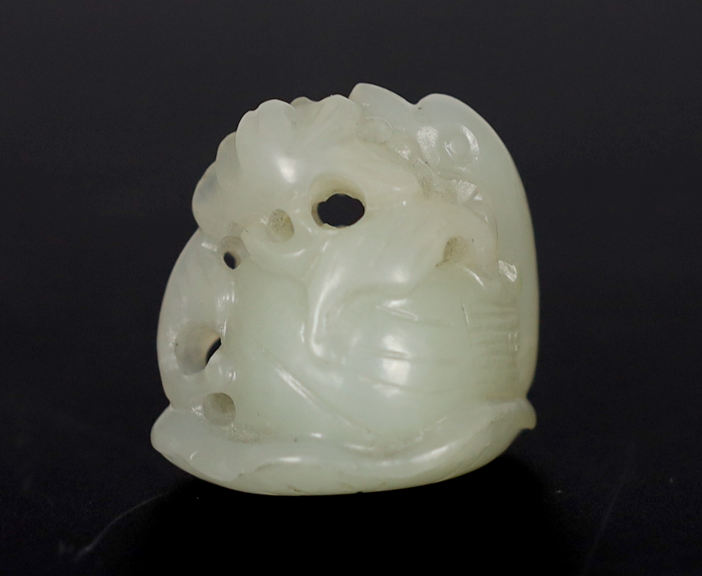 A Chinese small white jade carving of a stylised duck, late Qing dynasty
